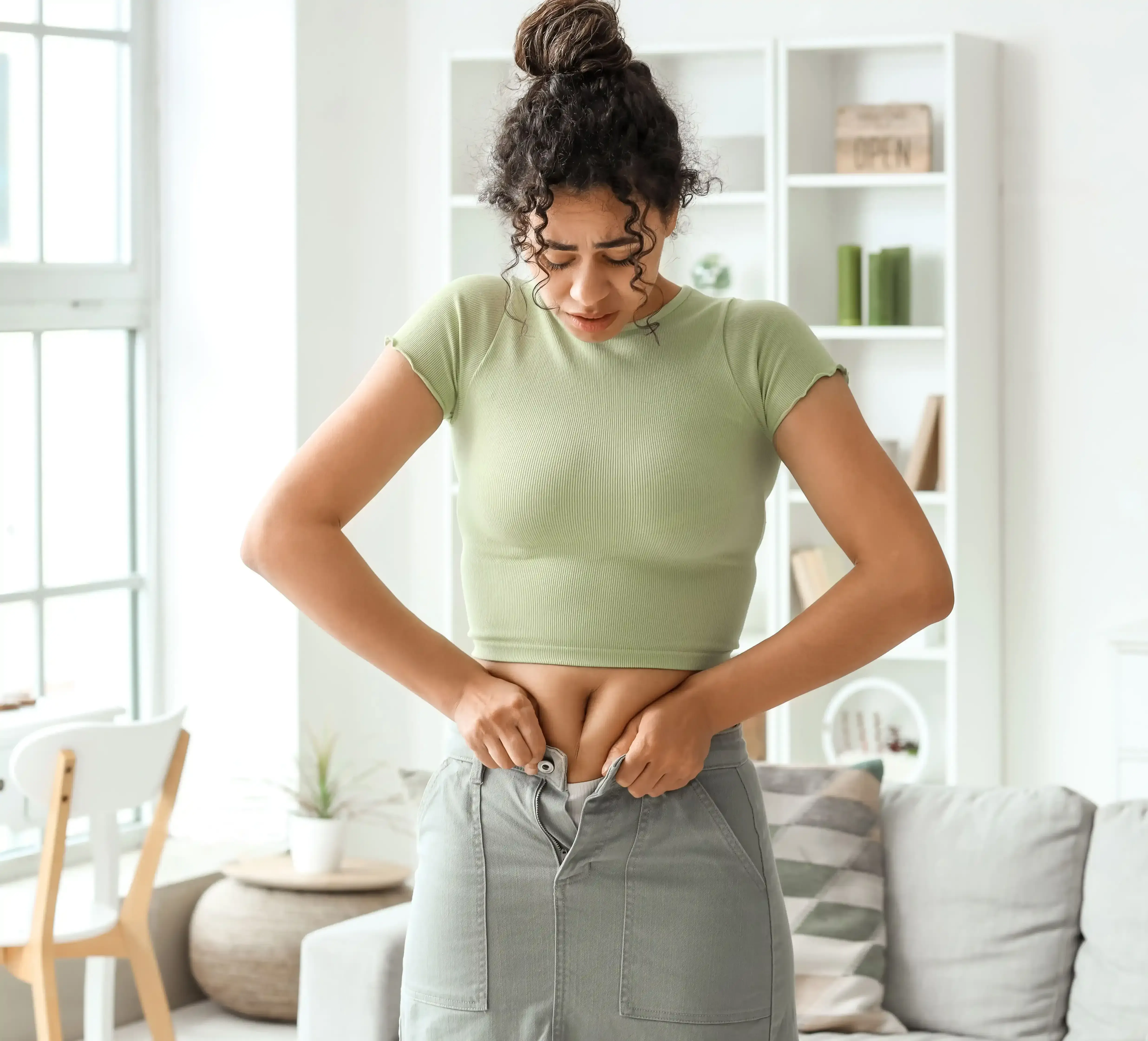 Provider reviewing weight management chart with patient at Riverstone Wellness