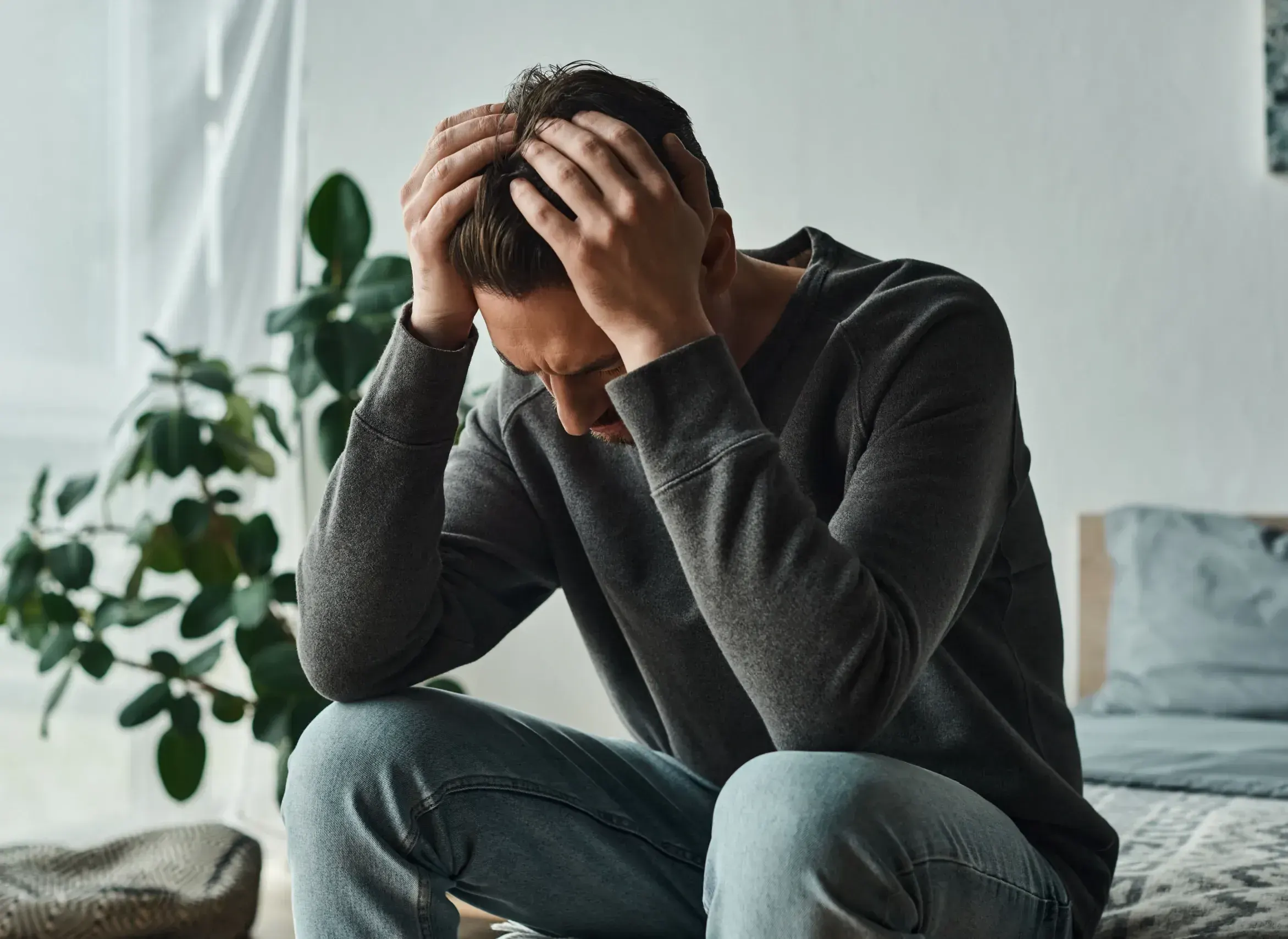 Person reflecting on depression symptoms before seeking care at Riverstone Wellness Easley